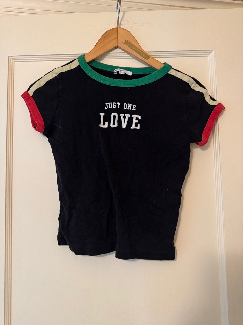 Subdued Black Graphic Crop Top with Contrast Trim and 'JUST ONE LOVE' Print